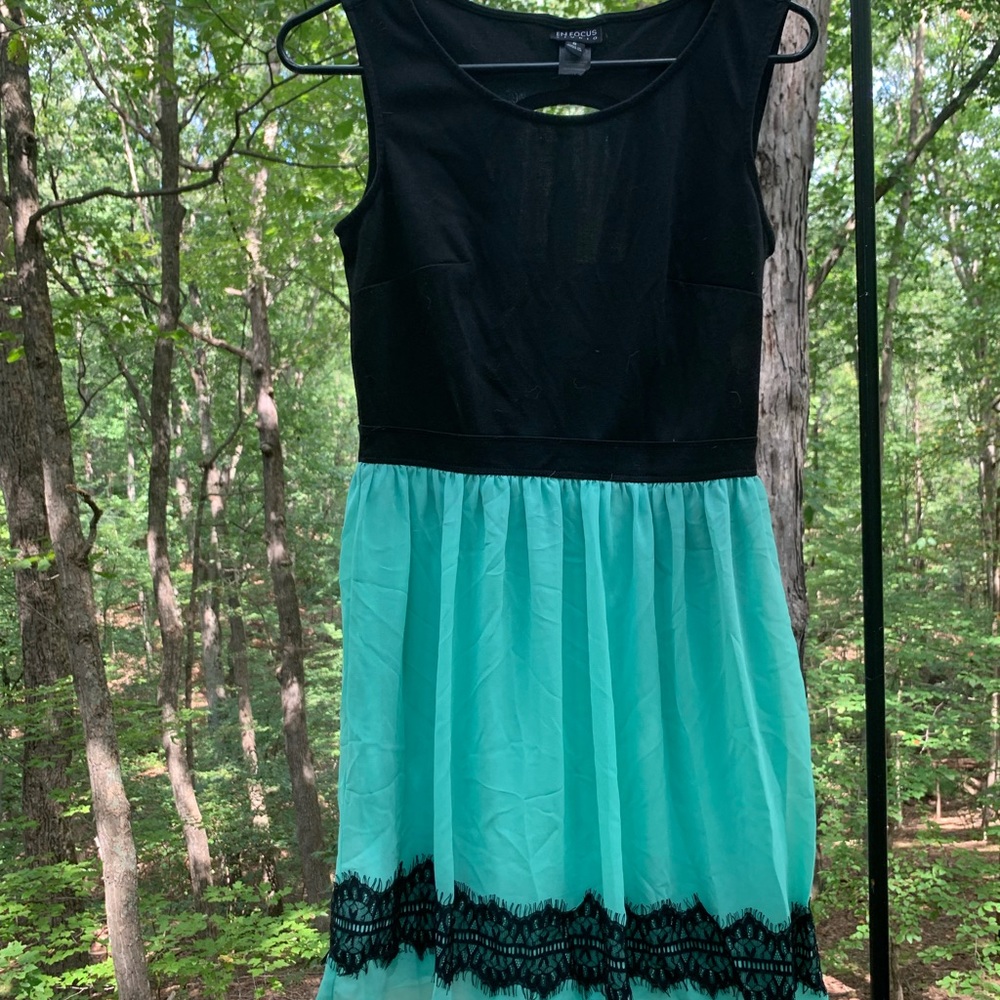 Black and teal lace accent dress
